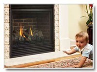 Baby to close to fireplace.